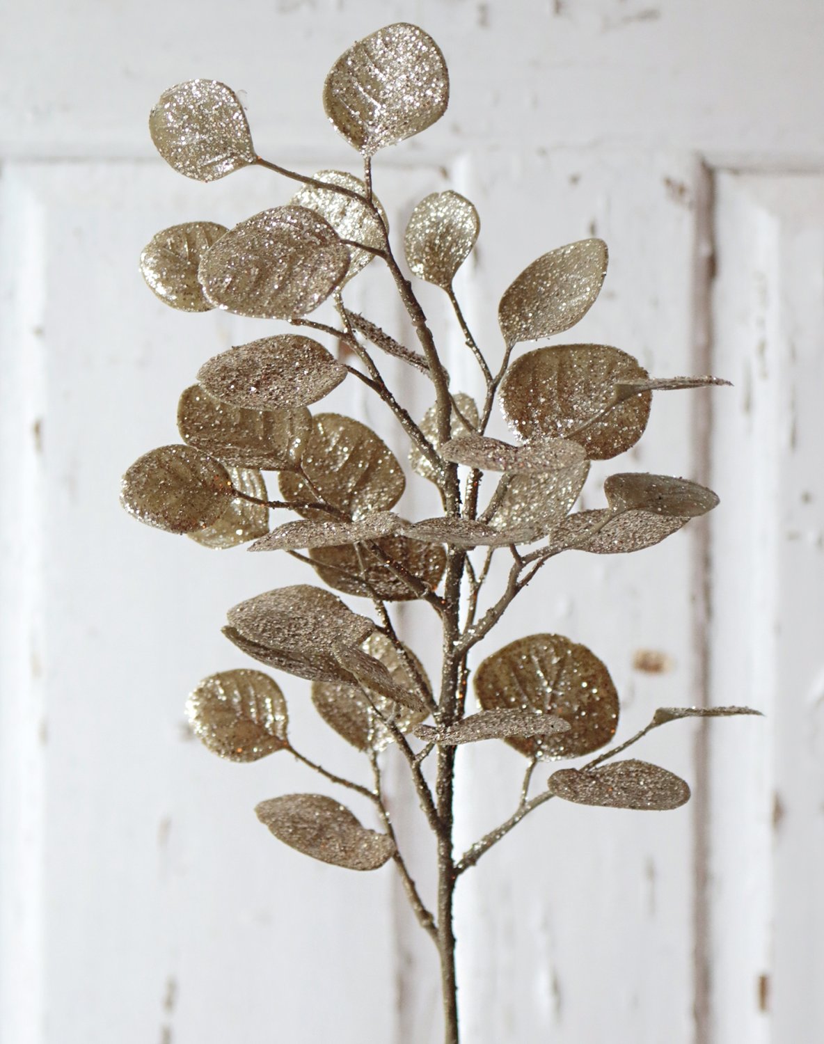 Rama falsa de eucalyptus con purpurina, 45 cm, dorada Rama falsa de eucalyptus con purpurina, 45 cm, dorada