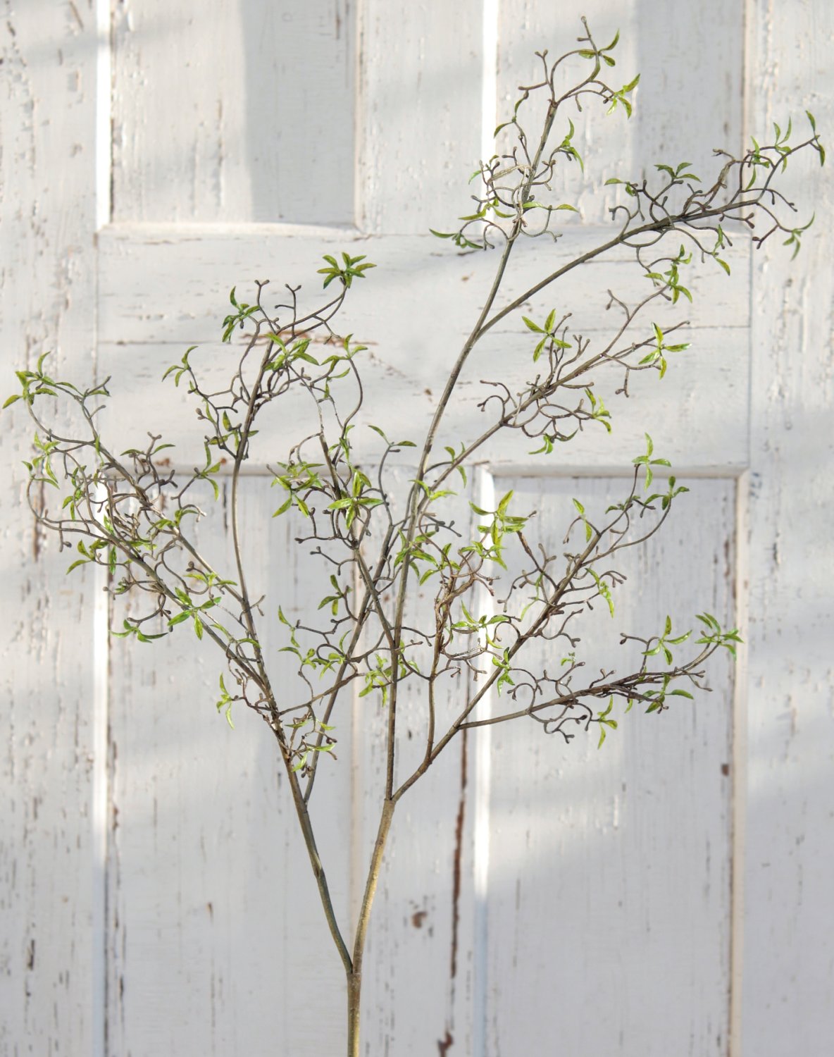 Artificial decorative twig with delicate leaves, 122 cm, green