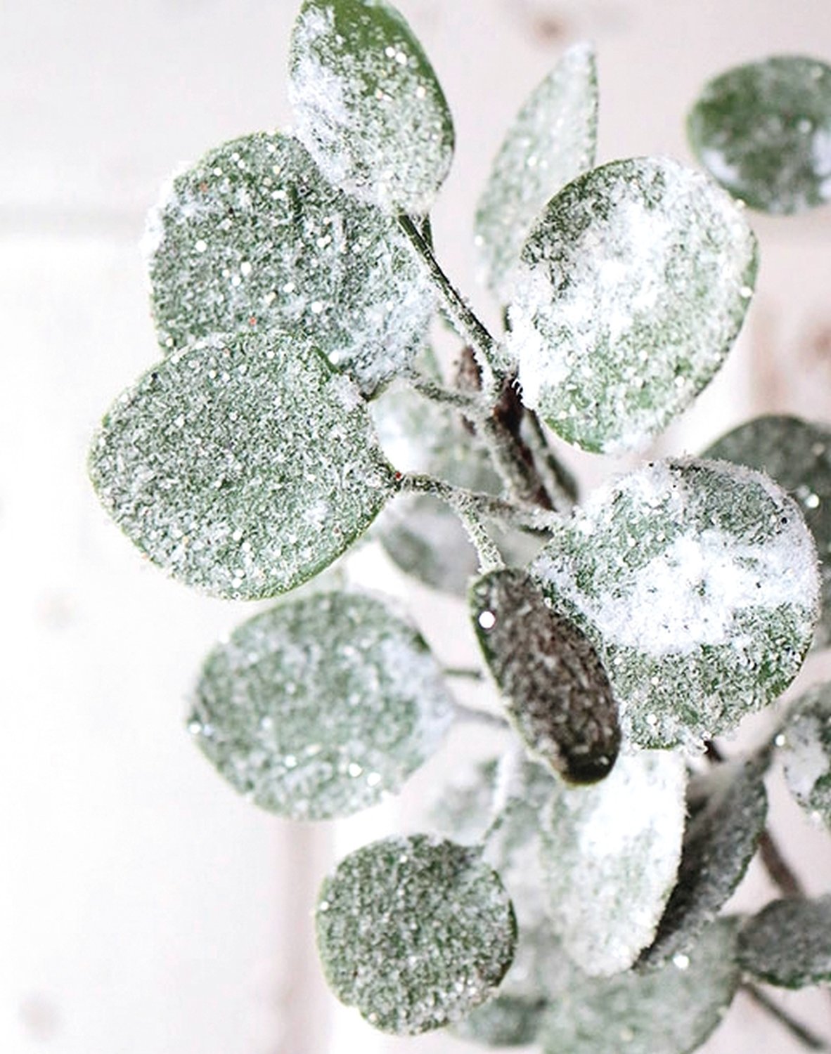 Faux eucalyptus stem with snow, 77 cm, frosted green